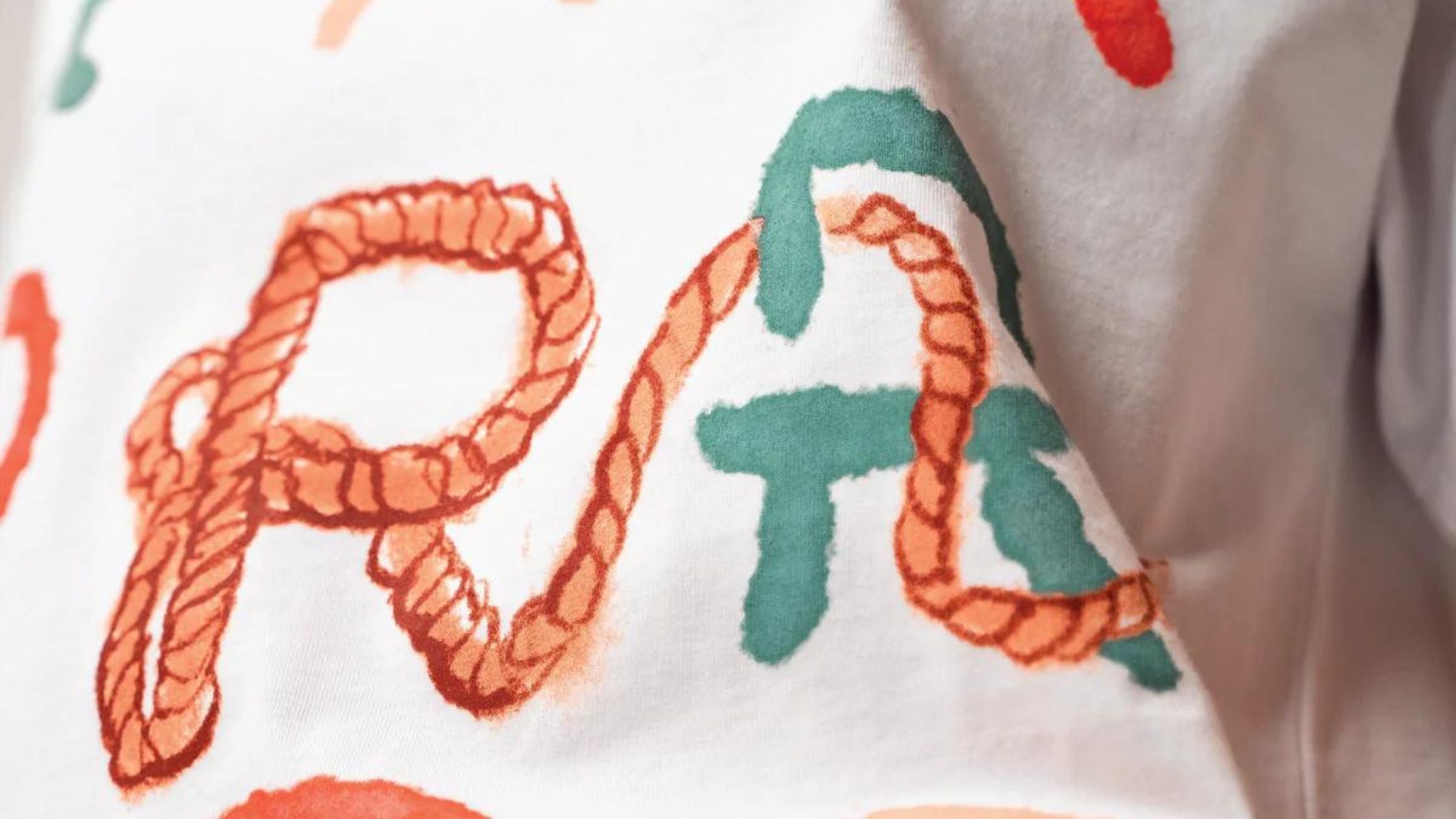 a detailed view of the lasso graphic tee by Ranchers