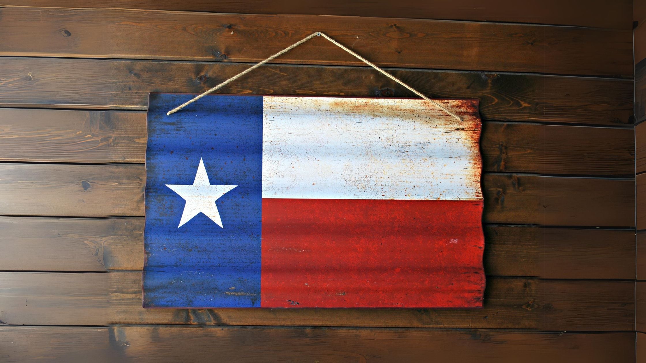 Texas flag decoration hanging on a wooden wall