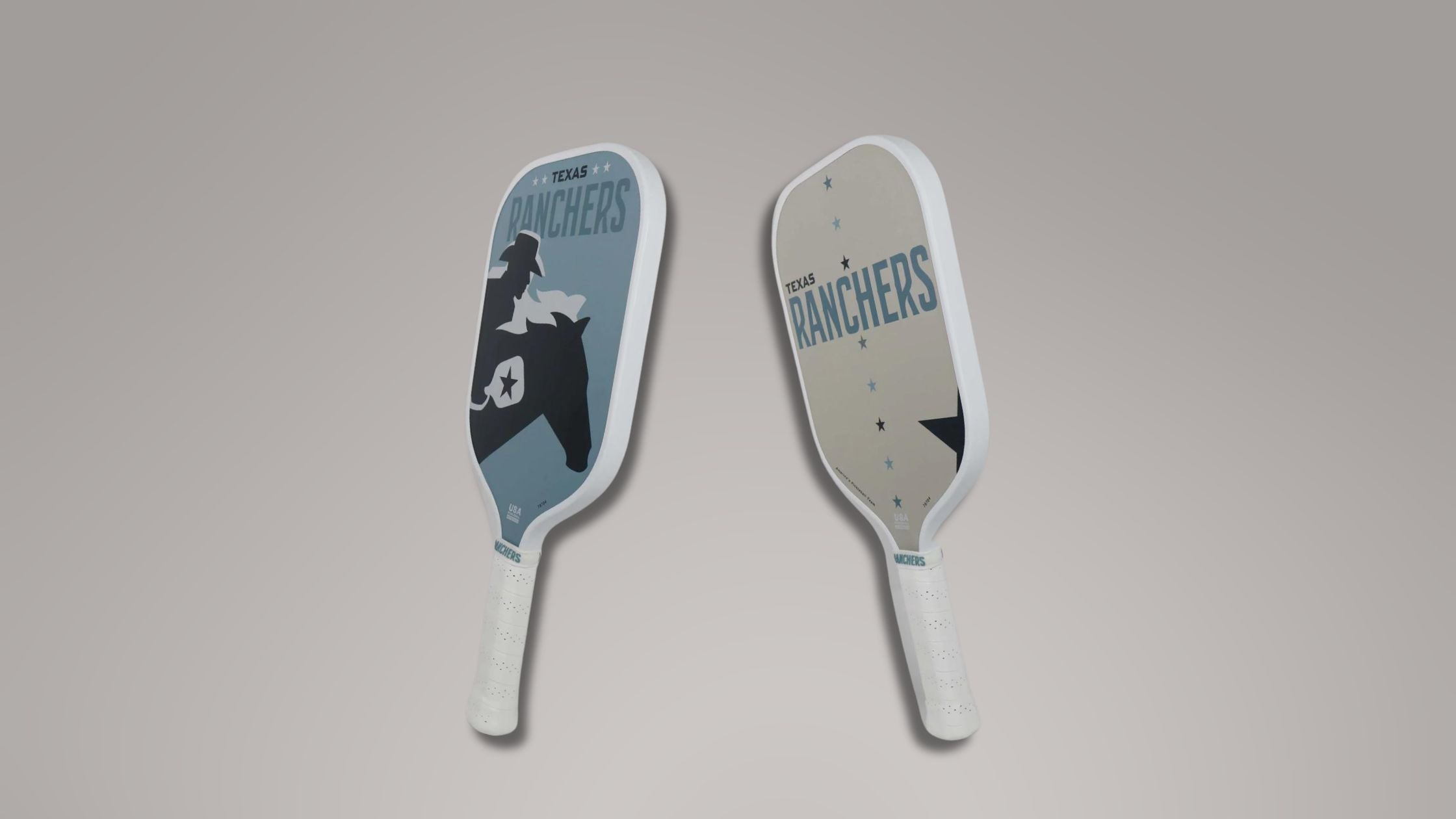 two paddles with a cowboy and horse design by Ranchers